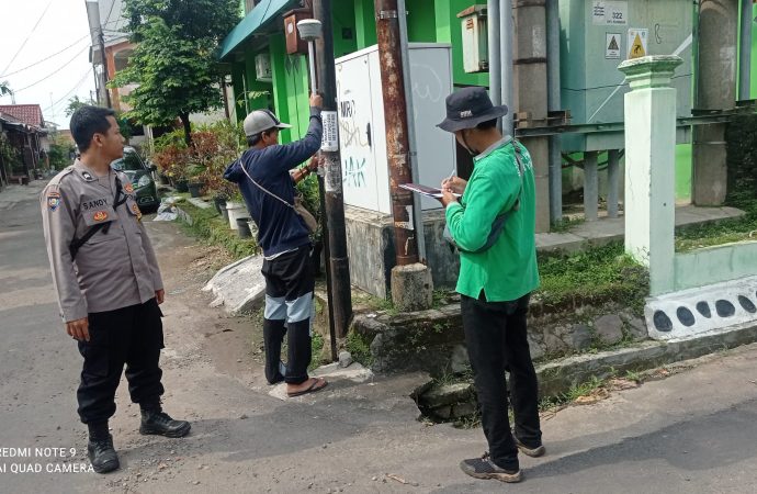 Bhabinkamtibmas Kepongpongan Dampingi Petugas BPN dalam PTSL