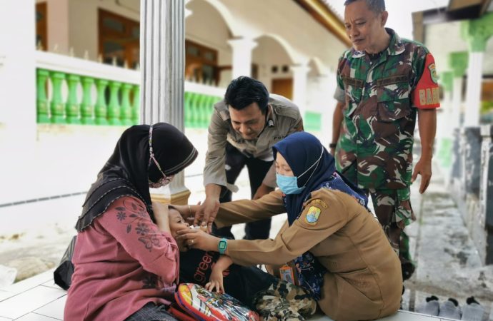 Bhabinkamtibmas Polsek Kelangenan Laksanakan Pendampingan Petugas Puskesmas